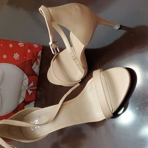 Shoes white and tan new in box an slightly worn tan like new